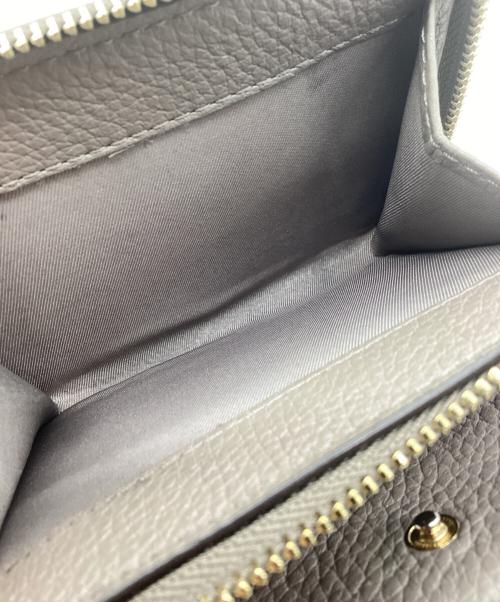 TORY BURCH（トリーバーチ）TORY BURCH (トリーバーチ) 2つ折り財布 ベージュの古着・服飾アイテム