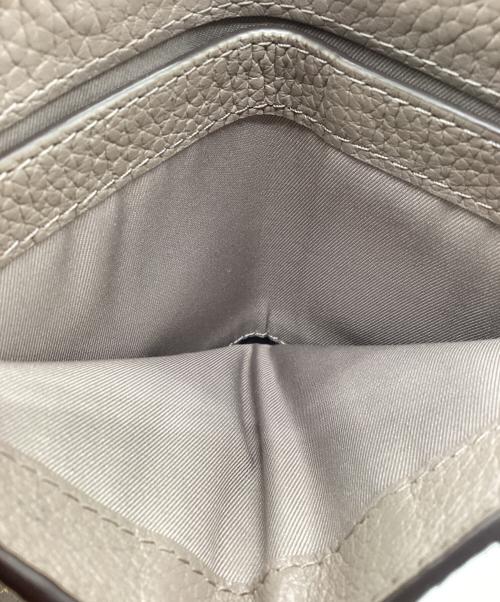 TORY BURCH（トリーバーチ）TORY BURCH (トリーバーチ) 2つ折り財布 ベージュの古着・服飾アイテム