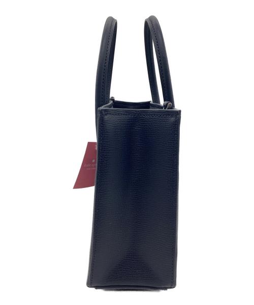 Kate Spade（ケイトスペード）Kate Spade (ケイトスペード) Disney (ディズニー) 不思議の国のアリス ハンドバッグ ネイビーの古着・服飾アイテム