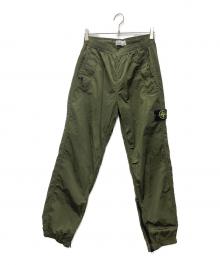 STONE ISLAND（ストーンアイランド）の古着「ナイロンパンツ」｜オリーブ
