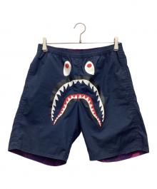 A BATHING APE（アベイシングエイプ）の古着「カラーカモ シャーク リバーシブル ショートパンツ」｜ネイビー