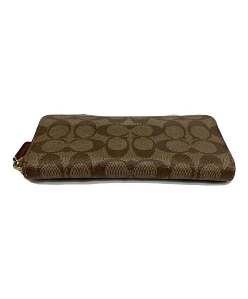 COACH（コーチ）COACH (コーチ) ラウンドファスナー財布 シグネチャーの古着・服飾アイテム
