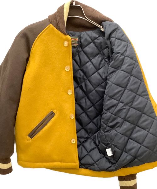 skookum（スクーカム）skookum (スクーカム) SKOOKUM　スタジャン イエロー×ブラウン サイズ:Sの古着・服飾アイテム
