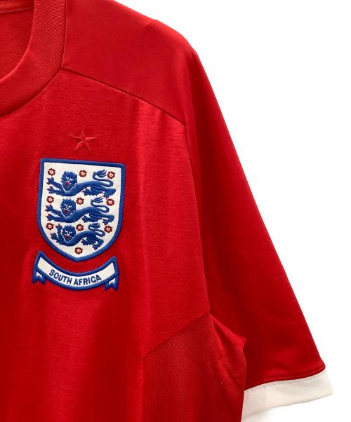 UMBRO（アンブロ）UMBRO (アンブロ) サッカーユニフォームUMBROレッド イングランド代表2010未使用品 レッド サイズ:SIZE 44 未使用品の古着・服飾アイテム