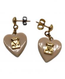 LOUIS VUITTON（ルイ ヴィトン）の古着「ブックルドレイユ ロックミー」