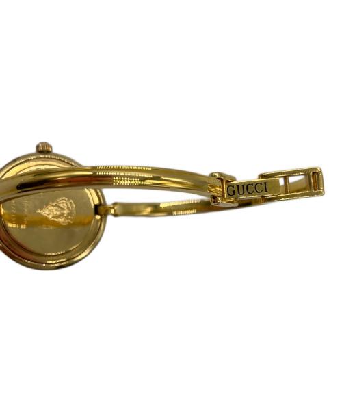 GUCCI（グッチ）GUCCI (グッチ) 腕時計　GUCCI　1100-L　チェンジベゼル　クォーツ　ケース、替えベゼル付　の古着・服飾アイテム