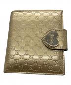 GUCCIグッチ）の古着「2つ折り財布　GUCCI　ゴールド　GG総柄　ハートプレート」｜ゴールド