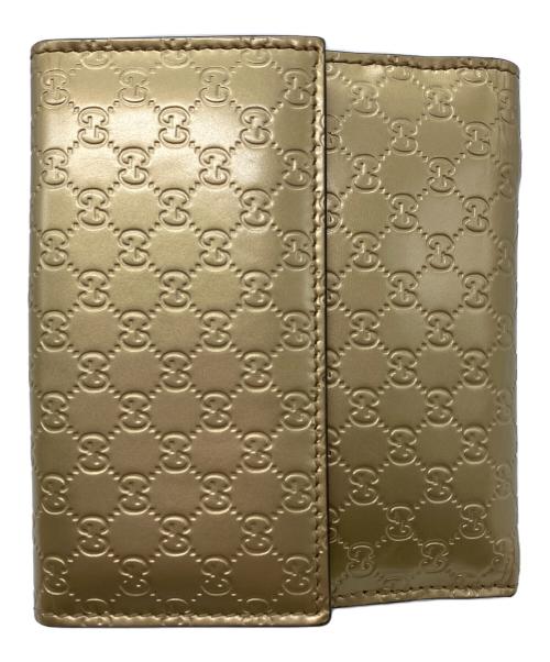 GUCCI（グッチ）GUCCI (グッチ) 2つ折り財布　GUCCI　ゴールド　GG総柄　ハートプレート ゴールドの古着・服飾アイテム