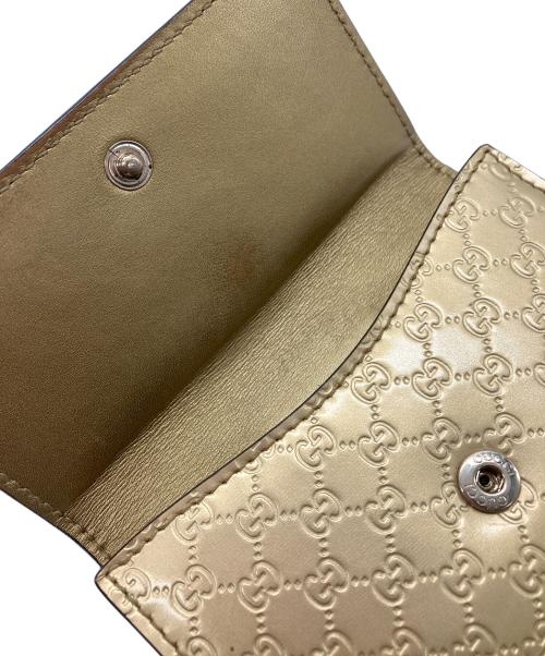 GUCCI（グッチ）GUCCI (グッチ) 2つ折り財布　GUCCI　ゴールド　GG総柄　ハートプレート ゴールドの古着・服飾アイテム