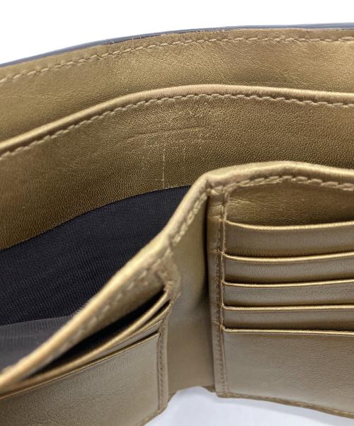 GUCCI（グッチ）GUCCI (グッチ) 2つ折り財布　GUCCI　ゴールド　GG総柄　ハートプレート ゴールドの古着・服飾アイテム