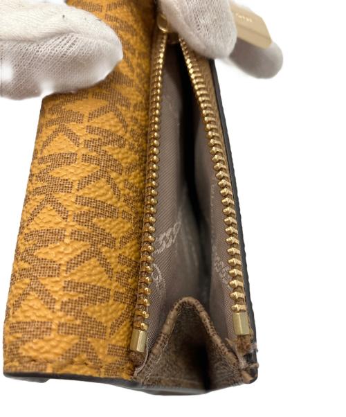 MICHAEL KORS（マイケル・コース）MICHAEL KORS (マイケル・コース) 3つ折り財布 イエロー×ブラウンの古着・服飾アイテム