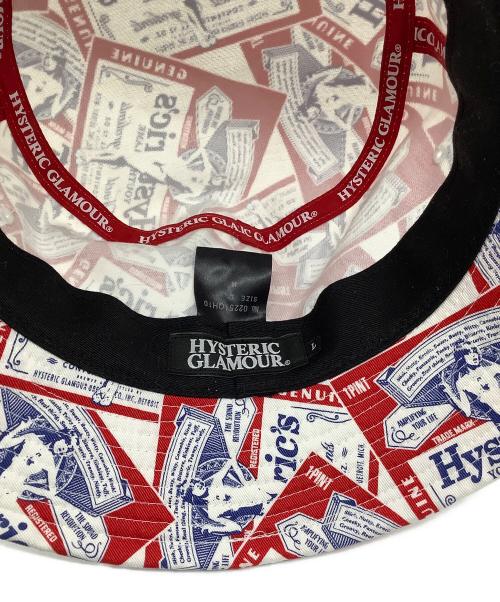 Hysteric Glamour（ヒステリックグラマー）Hysteric Glamour (ヒステリックグラマー) LABEL柄バケットハット ホワイト×レッドの古着・服飾アイテム