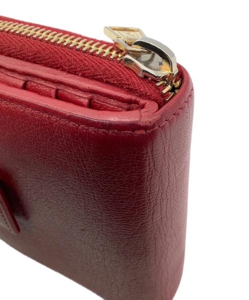 Yves Saint Laurent（イヴサンローラン）Yves Saint Laurent (イヴサンローラン) 2つ折り財布 レッドの古着・服飾アイテム