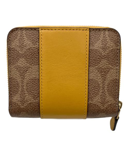 COACH（コーチ）COACH (コーチ) ラウンドファスナー財布 ブラウン×イエローの古着・服飾アイテム
