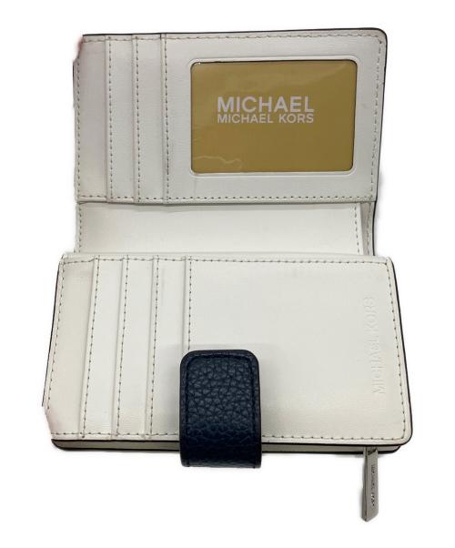 MICHAEL KORS（マイケルコース）MICHAEL KORS (マイケルコース) 2つ折り財布 スカイブルーの古着・服飾アイテム