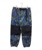 NIKE ACGナイキエーシージー）の古着「総柄トレイルパンツ」｜グリーン