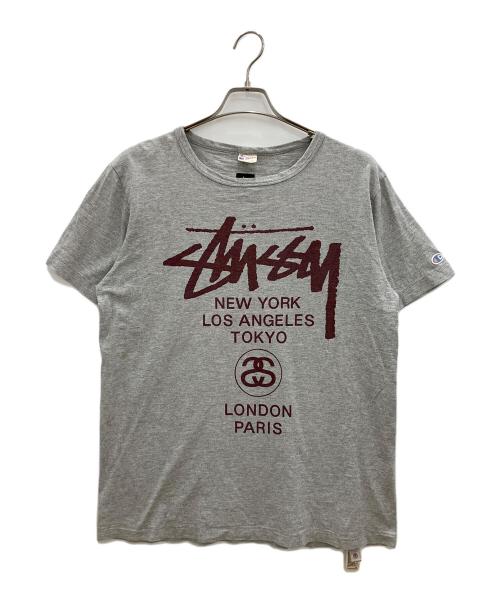 Champion（チャンピオン）Champion (チャンピオン) stussy (ステューシー) 半袖カットソー　ランナーズタグ グレー サイズ:Lの古着・服飾アイテム