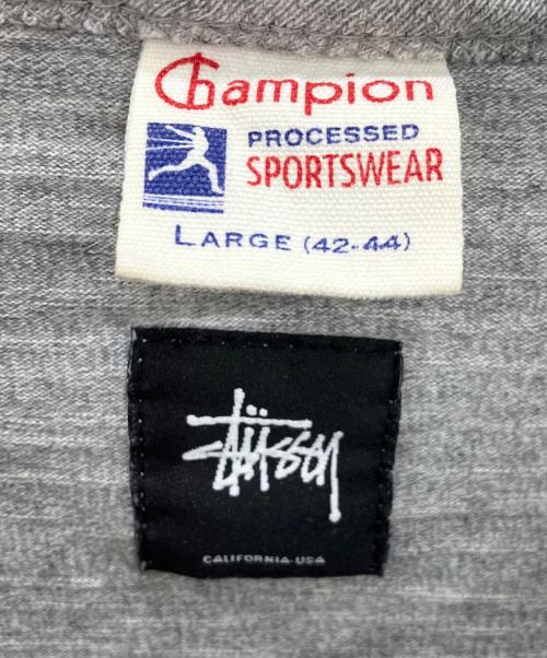 Champion（チャンピオン）Champion (チャンピオン) stussy (ステューシー) 半袖カットソー　ランナーズタグ グレー サイズ:Lの古着・服飾アイテム