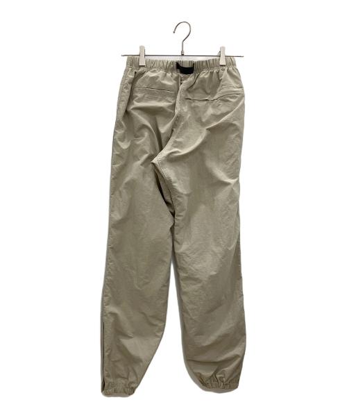 GRAMICCI（グラミチ）GRAMICCI (グラミチ) ナイロントラックパンツ カーキ サイズ:Sの古着・服飾アイテム