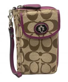 COACH（コーチ）の古着「財布　シグネチャー」｜ベージュ×パープル