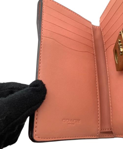 COACH（コーチ）COACH (コーチ) 2つ折り財布 ピンクの古着・服飾アイテム