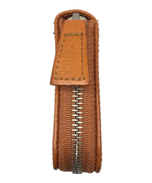 Carving Tribes（カービングトライブス）Carving Tribes (カービングトライブス) ジップウォレット キャメルの古着・服飾アイテム