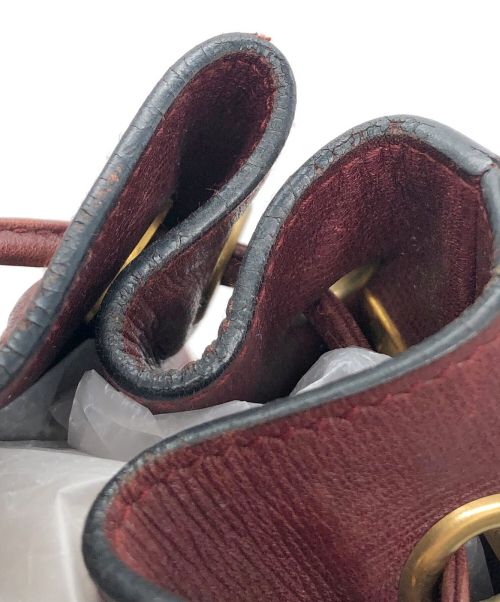 Cartier（カルティエ）Cartier (カルティエ) 巾着型ショルダーバッグ マストライン ボルドーの古着・服飾アイテム