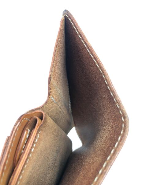 GENUINE BRIDLE（ジェニュイン ブライドル）GENUINE BRIDLE (ジェニュイン ブライドル) 2つ折り財布 ブラウンの古着・服飾アイテム