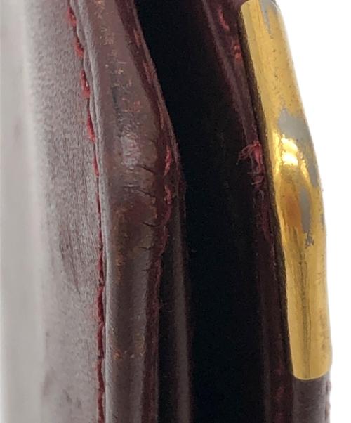 Cartier（カルティエ）Cartier (カルティエ) 2つ折り財布　マストライン ボルドーの古着・服飾アイテム