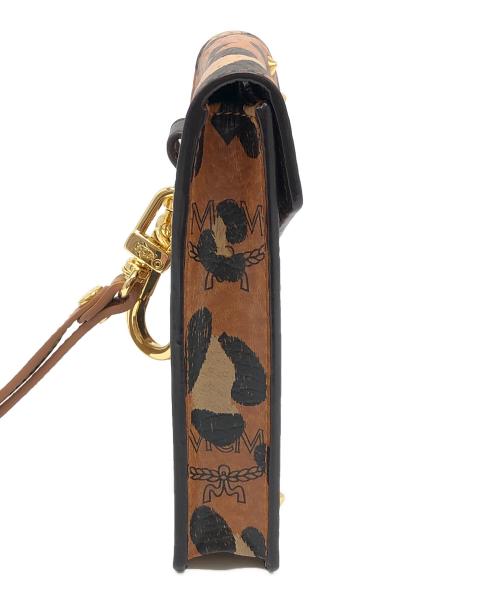 MCM（エムシーエム）MCM (エムシーエム) レオパードエンブレムロゴレザーフックケース ブラウンの古着・服飾アイテム