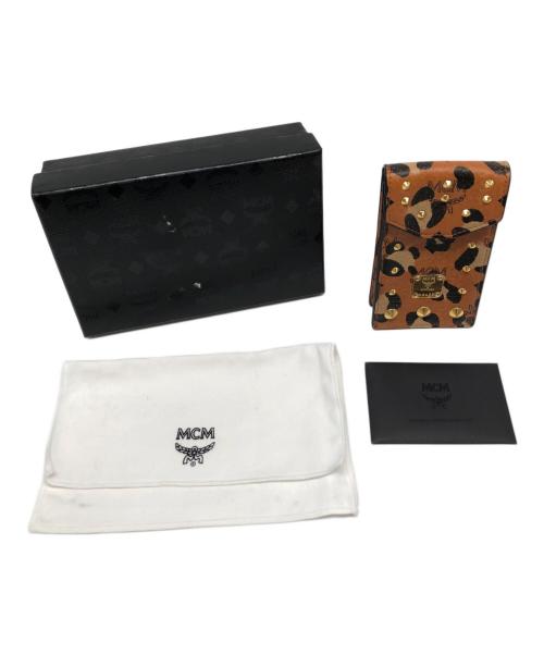 MCM（エムシーエム）MCM (エムシーエム) レオパードエンブレムロゴレザーフックケース ブラウンの古着・服飾アイテム