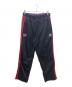 adidas（アディダス）の古着「リバーシブルトラックパンツ」｜ブラック×レッド×パープル