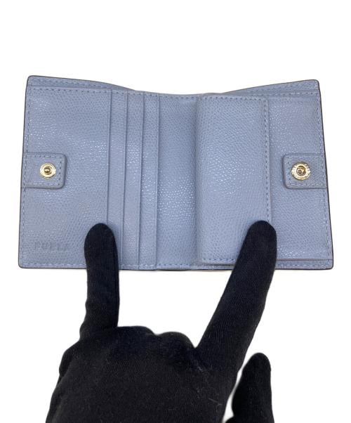 FURLA（フルラ）FURLA (フルラ) 2つ折り財布 ライトブルーの古着・服飾アイテム