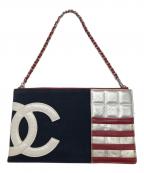 CHANELシャネル）の古着「アクセサリーポーチ　チョコバー　星条旗モチーフ」