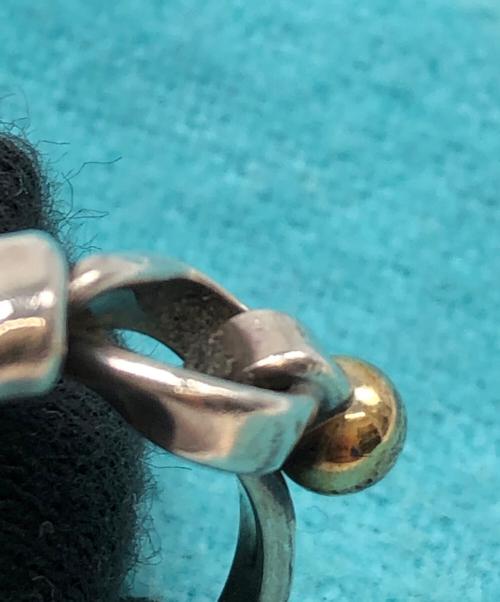 TIFFANY & Co.（ティファニー）Tiffany & Co. (ティファニー) ラブノットリング シルバー サイズ:2.6gの古着・服飾アイテム