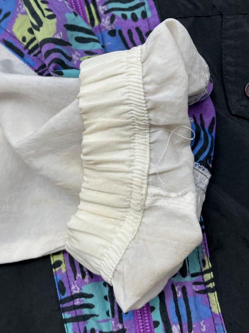 NIKE（ナイキ）NIKE (ナイキ) 90sナイロンジャケット 黒タグ 古着 ブラック×パープル サイズ:Ｍの古着・服飾アイテム