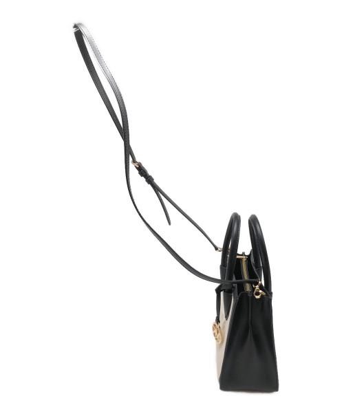 MICHAEL KORS（マイケル・コース）MICHAEL KORS (マイケル・コース) 	Mercer Medium Logo Embossed Cotton Canvas Crossbody Bag ホワイト×ブラックの古着・服飾アイテム