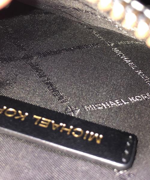 MICHAEL KORS（マイケル・コース）MICHAEL KORS (マイケル・コース) 	Mercer Medium Logo Embossed Cotton Canvas Crossbody Bag ホワイト×ブラックの古着・服飾アイテム