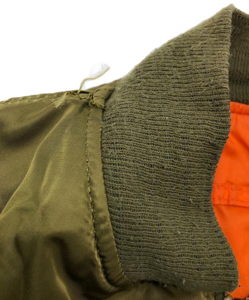 ALPHA INDUSTRIES（アルファインダストリーズ）ALPHA INDUSTRIES (アルファインダストリーズ) MA-1ジャケット　ストック:0615-00-573-8335 カーキ×オレンジ サイズ:XLの古着・服飾アイテム