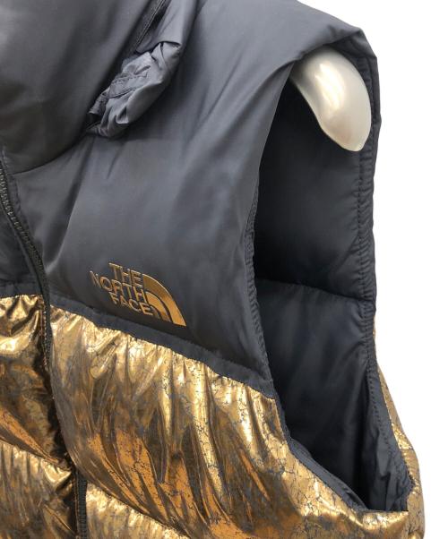 THE NORTH FACE（ザ ノース フェイス）THE NORTH FACE (ザ ノース フェイス) 中綿ベスト　1996 RETRO NUPTSE ブラック×ゴールドカラー サイズ:XSの古着・服飾アイテム