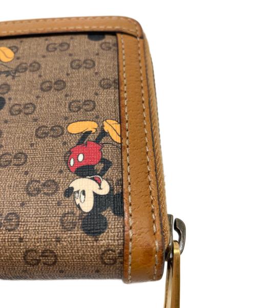 GUCCI（グッチ）GUCCI (グッチ) DISNEY (ディズニー) ミニGGスプリームジップアラウンドウォレット ブラウンの古着・服飾アイテム
