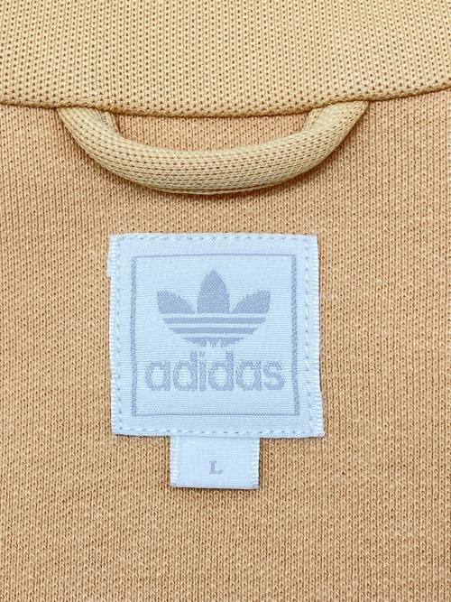 adidas（アディダス）adidas (アディダス) 80sトラックジャケット 銀タグ 万国旗タグ 古着 ベージュ×ブラウン サイズ:Lの古着・服飾アイテム