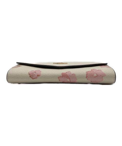 COACH（コーチ）COACH (コーチ) エンベロープ・ウォレット フローラルプリント長財布 アイボリーの古着・服飾アイテム