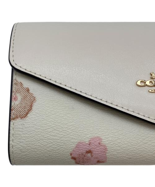 COACH（コーチ）COACH (コーチ) エンベロープ・ウォレット フローラルプリント長財布 アイボリーの古着・服飾アイテム