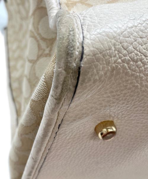 COACH（コーチ）COACH (コーチ) デンプシー40 ベージュの古着・服飾アイテム