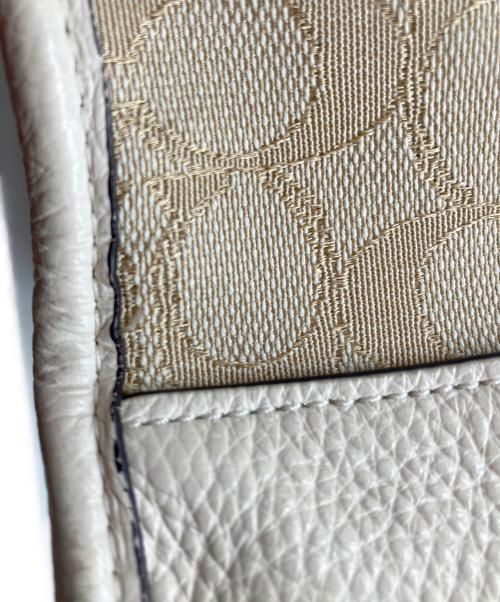 COACH（コーチ）COACH (コーチ) デンプシー40 ベージュの古着・服飾アイテム