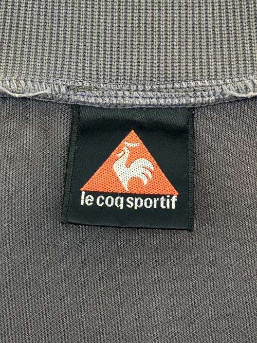 le coq sportif（ルコックスポルティフ）le coq sportif (ルコックスポルティフ) 90sトラックジャケット Y2K 古着 グレー×グリーン サイズ:Ｍの古着・服飾アイテム