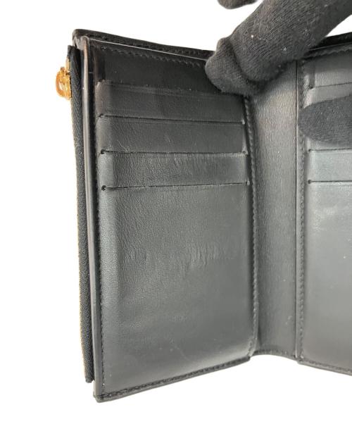 LOUIS VUITTON（ルイ ヴィトン）LOUIS VUITTON (ルイ ヴィトン) ポルトフォイユ・カプシーヌコンパクト	フラワーキルティング ブラック×ゴールドの古着・服飾アイテム