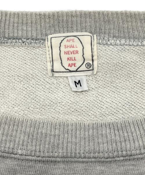 A BATHING APE（アベイシングエイプ）A BATHING APE (アベイシングエイプ) 90sラグランスウェット　APE SHALL NEVER KILL APE　初期タグ　古着 グレー サイズ:Ｍの古着・服飾アイテム