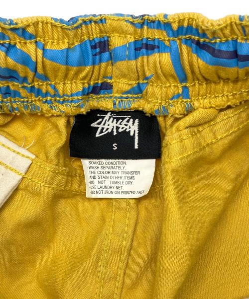 stussy（ステューシー）stussy (ステューシー) ハーフパンツ イエロー×ブルー サイズ:Ｓの古着・服飾アイテム
